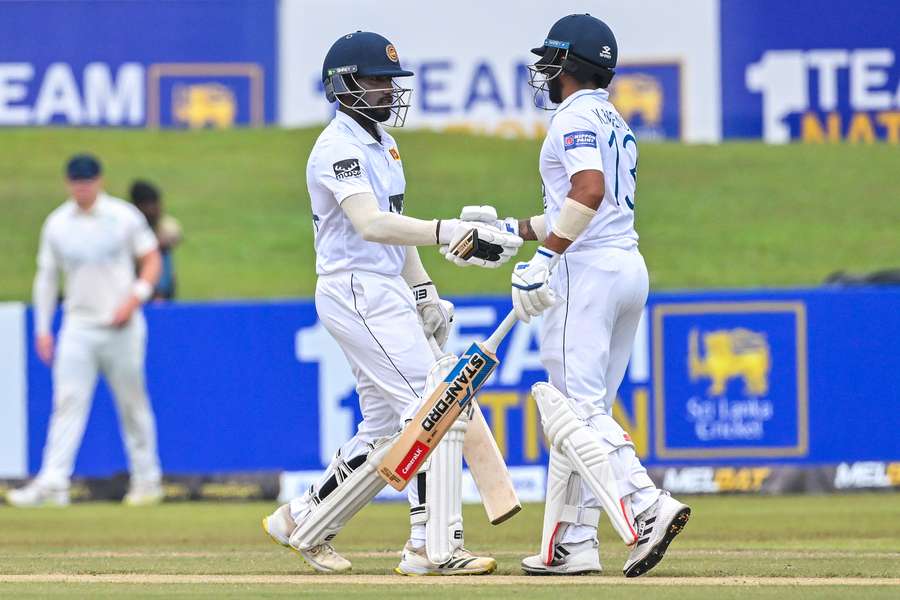 Sri Lanka's Nishan Madushka (L) celebrates with his teammate Kusal Mendis