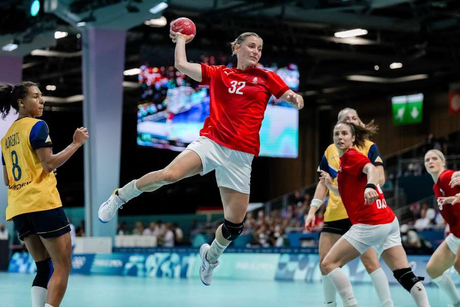 Mie Hojlund (wearing white shorts) action for Denmark during the Paris Olympics