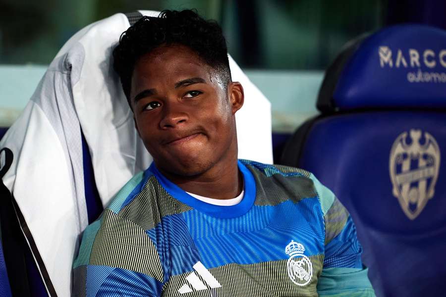 Real Madrid's Endrick sat on the bench during the match against Levante