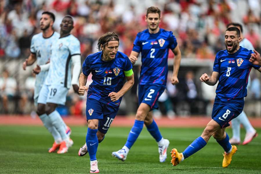 Modric celebrates after scoring from the spot