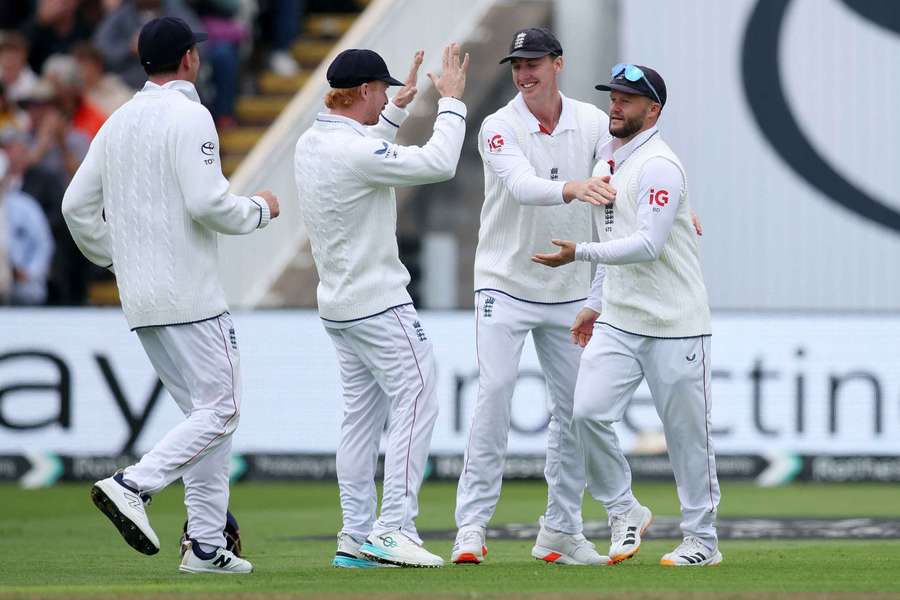 England's Ben Duckett celebrates after taking the catch to dismiss Pakistan's Razaullah, off the bowling of Ollie Robinson