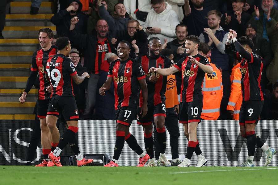 Bournemouth celebrate scoring their opening goal against Arsenal on Saturday