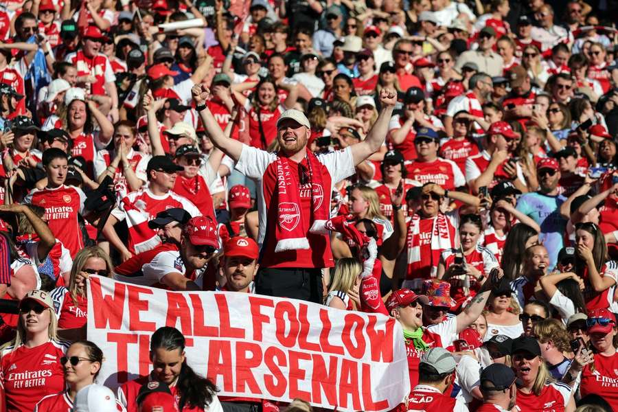 Supporters of Arsenal celebrate after their victory at the end of the UEFA Women's Champions League final