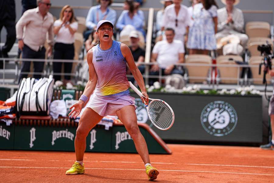 Iga Swiatek celebrates her win
