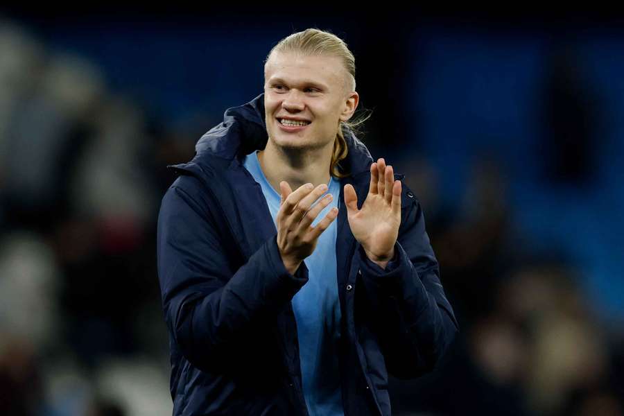 Erling Haaland applauds the fans after the game