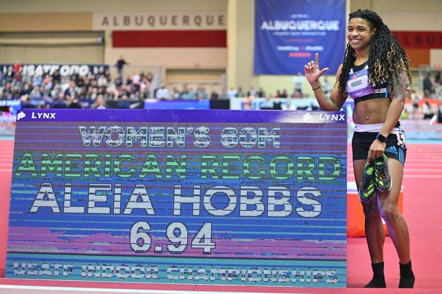 Hobbs celebrates after he historic win