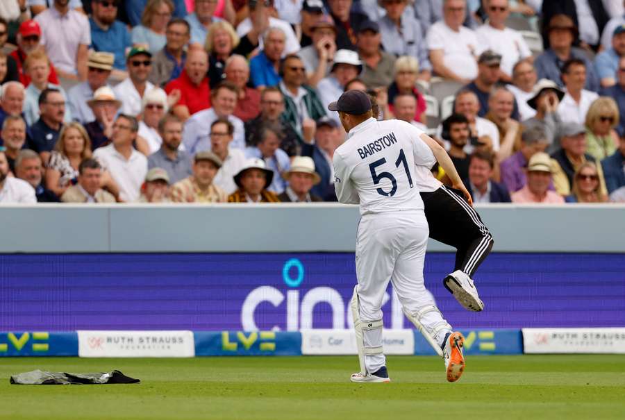 Bairstow carrying off a Just Stop Oil protestor