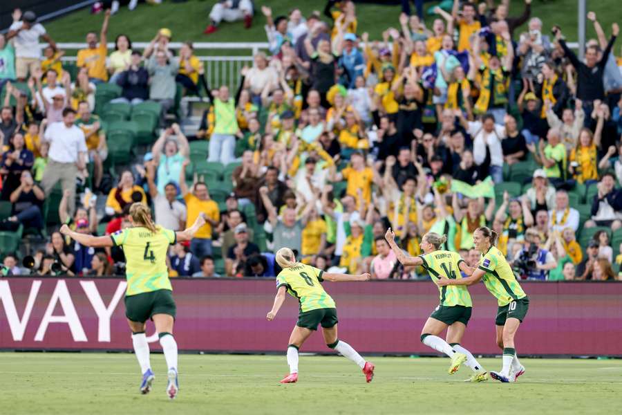 Alanna Kennedy and team celebrate their win over DPR Korea. 
