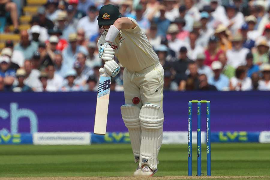 Australia's Steve Smith is trapped LBW (leg before wicket) by a ball from England's captain Ben Stokes during play on day two