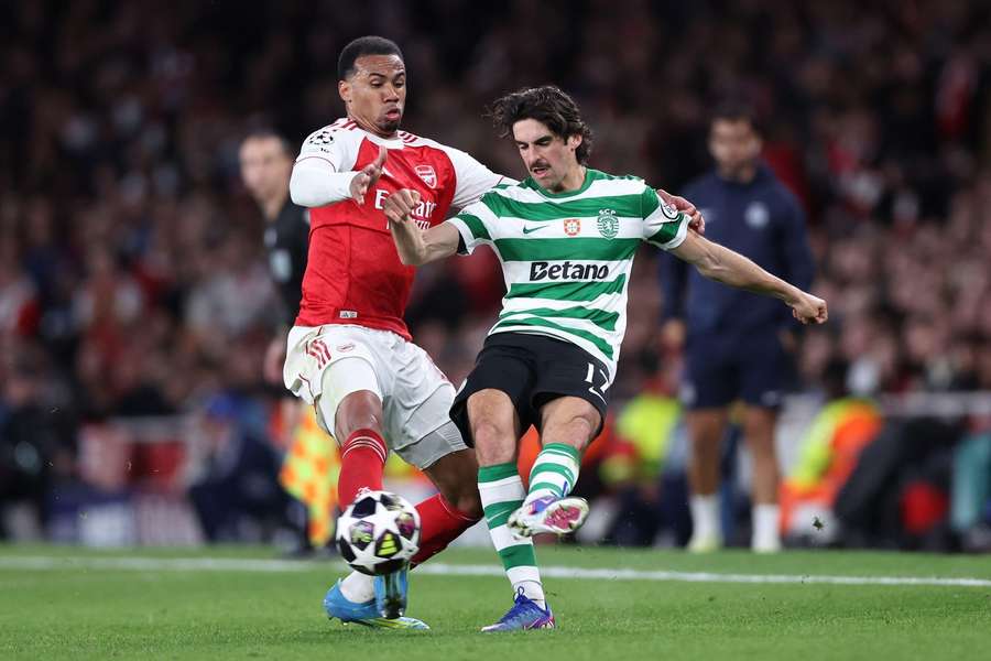 Arsenal's Gabriel challenges Sporting's Trincao in their Champions League quarter-final 2nd leg match