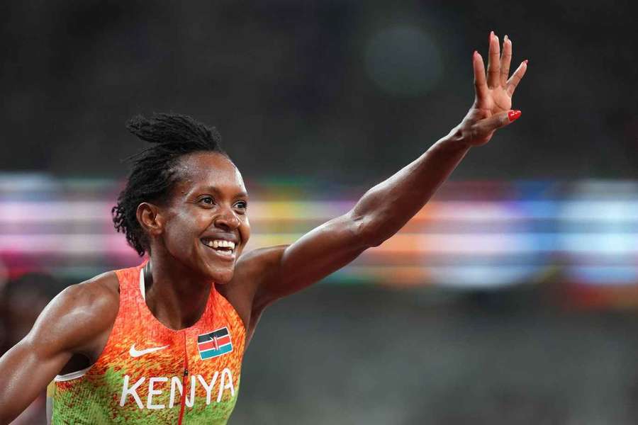 Kipyegon when she won her third consecutive world title in the women's 1,500m at the World Athletics Championships in Tokyo
