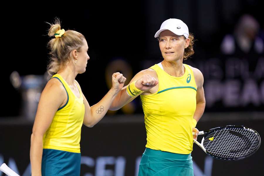 Australia's Storm Sanders and Sam Stosur in action