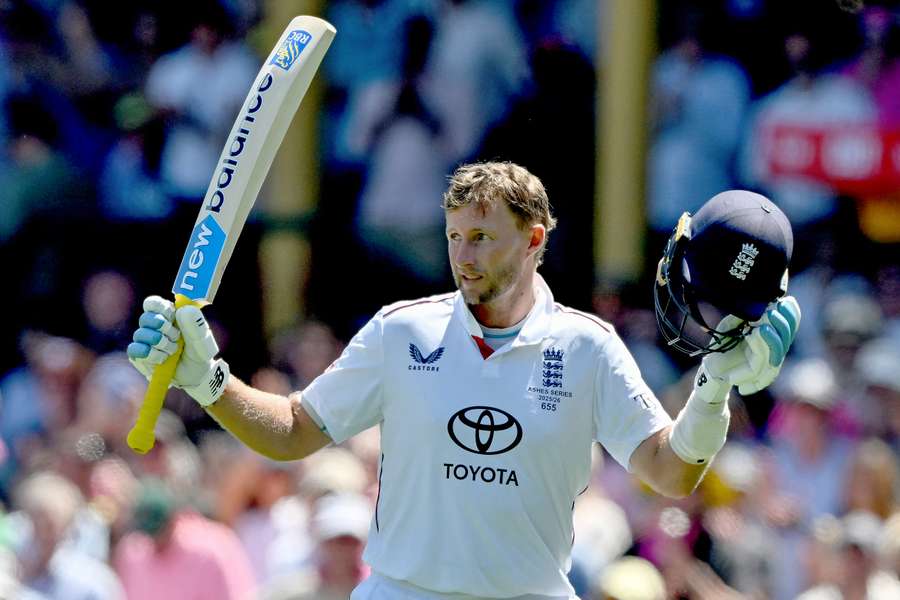Joe Root celebrates his Test century in Sydney on Monday afternoon.