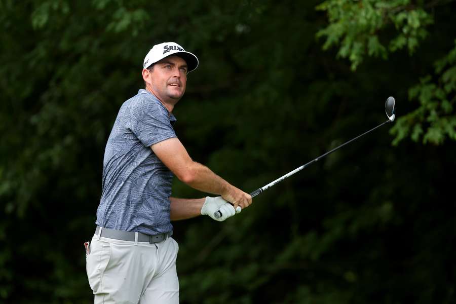 Keegan Bradley watches his shot from the 12th tee during the second round