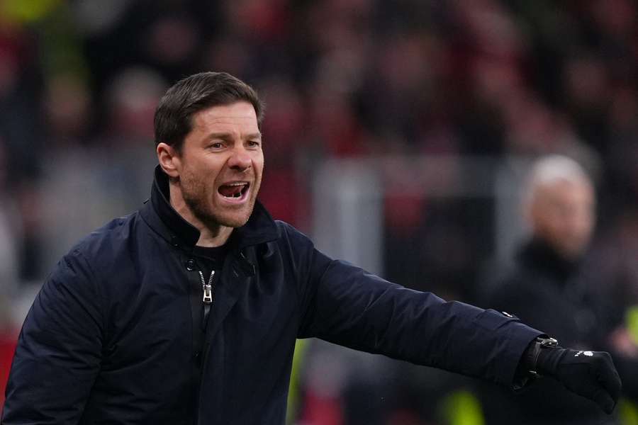 Xabi Alonso relieved with Bayer Leverkusen victory despite going down to 10 men.