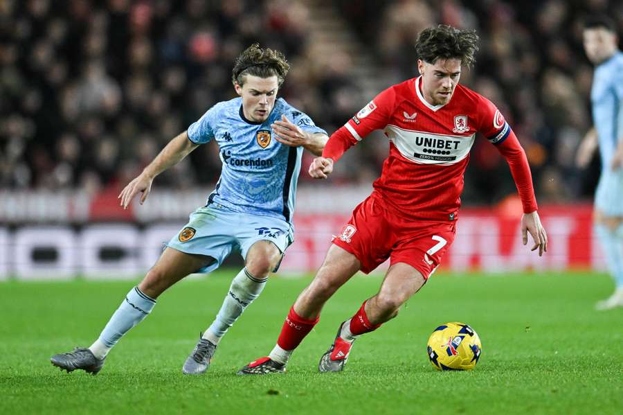 Middlesbrough's Hayden Hackney and Hull's Regan Slater engage in a midfield battle Middlesbrough's Hayden Hackney and Hull's Regan Slater engage in a midfield battle