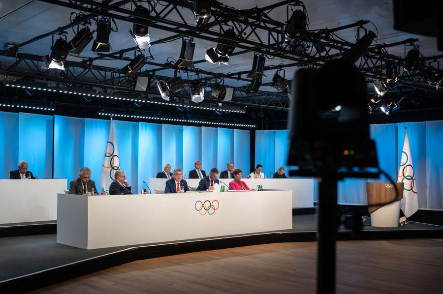 German International Olympic Committee (IOC) President Thomas Bach (C) and members of IOC executive board attend in Lausanne