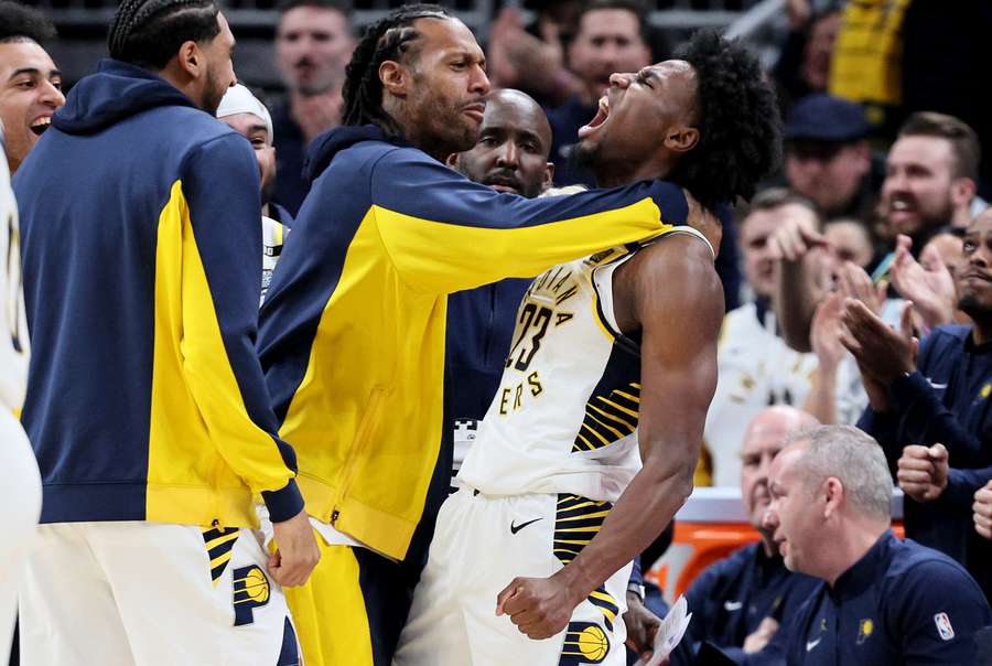 The Pacers celebrate their win