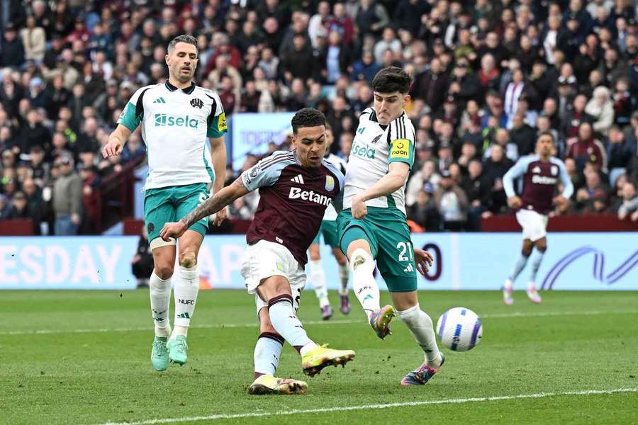Aston Villa's Morgan Rogers has a shot v Newcastle United on 19 Apr 2025