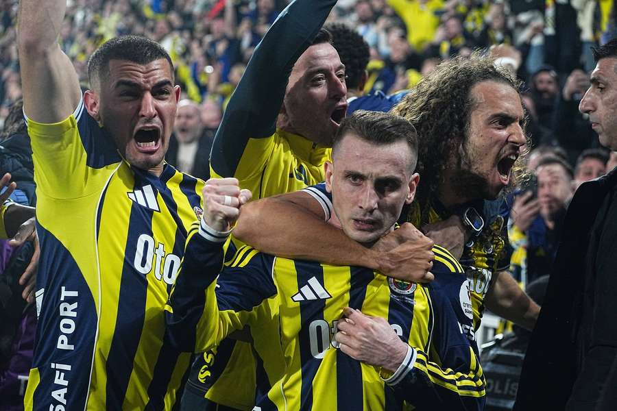 Fenerbahce celebrate their late winner Fenerbahce celebrate their late winner