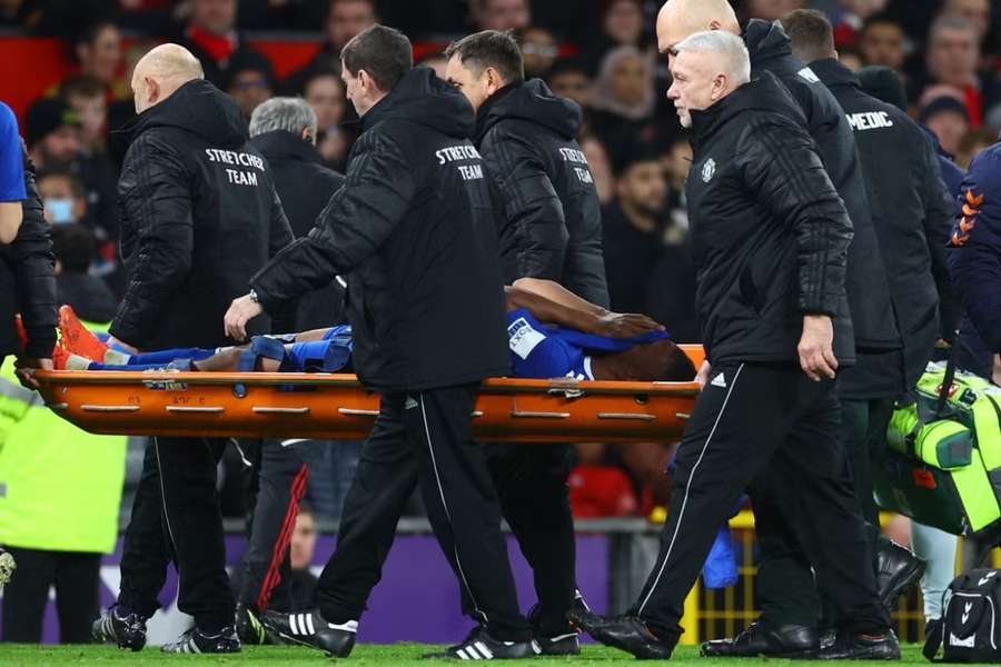 Iwobi was stretchered off against United