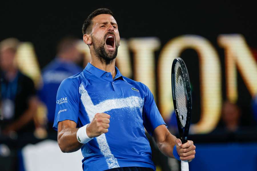 Novak Djokovic celebrates victory against Tomas Machac