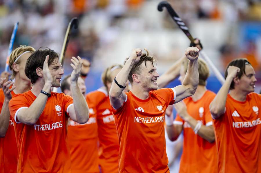 De hockeyers van Oranje vieren de zege op Australië