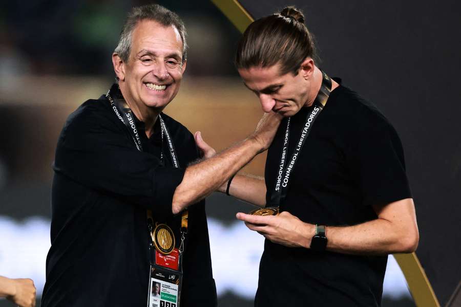 Bap ao lado de Filipe após a conquista da Libertadores Bap ao lado de Filipe após a conquista da Libertadores