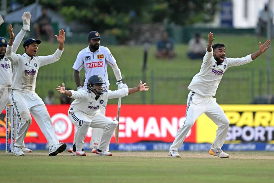 India's Manav Suthar (right) appeals for LBW against Sri Lanka's Prabath Jayasuriya late on the second day of the second Test India's Manav Suthar (right) appeals for LBW against Sri Lanka's Prabath Jayasuriya late on the second day of the second Test