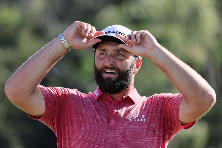 Jon Rahm smiles during the trophy ceremony