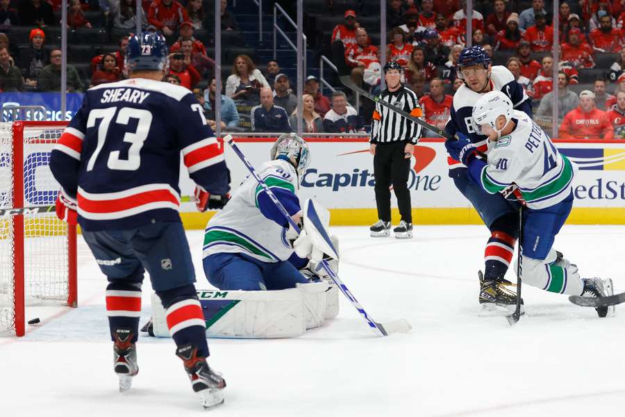 Alex Ovechkin scored two for the Capitals against the Canucks