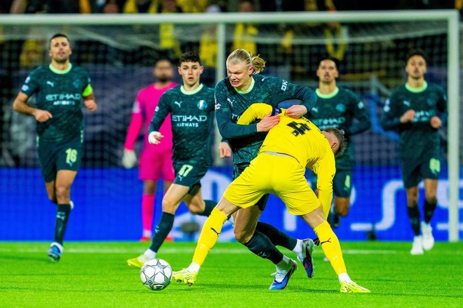 Manchester City's Erling Braut Haaland struggles to get past Odin Bjortuft