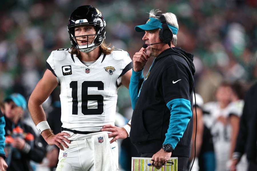 Jaguars quarterback Trevor Lawrence talking with former head coach Doug Pederson on the sidelines (2024)