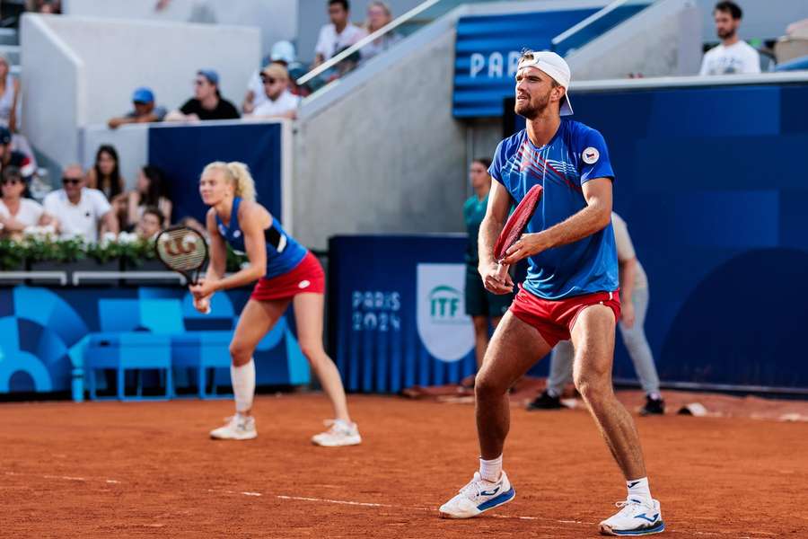 Tomáš Macháč se ve čtvrtek pokusí o dva postupy do finále olympijského turnaje.