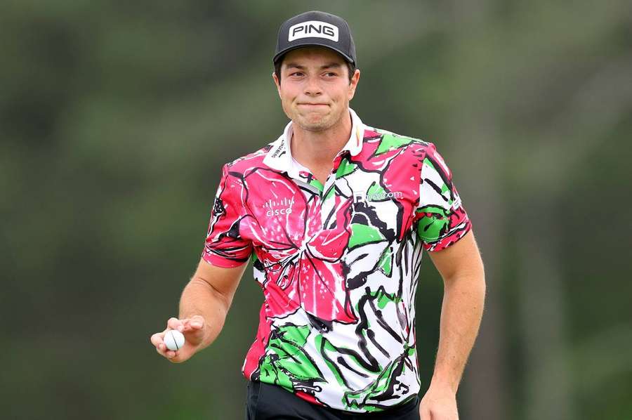 Viktor Hovland reacts on the 18th green 