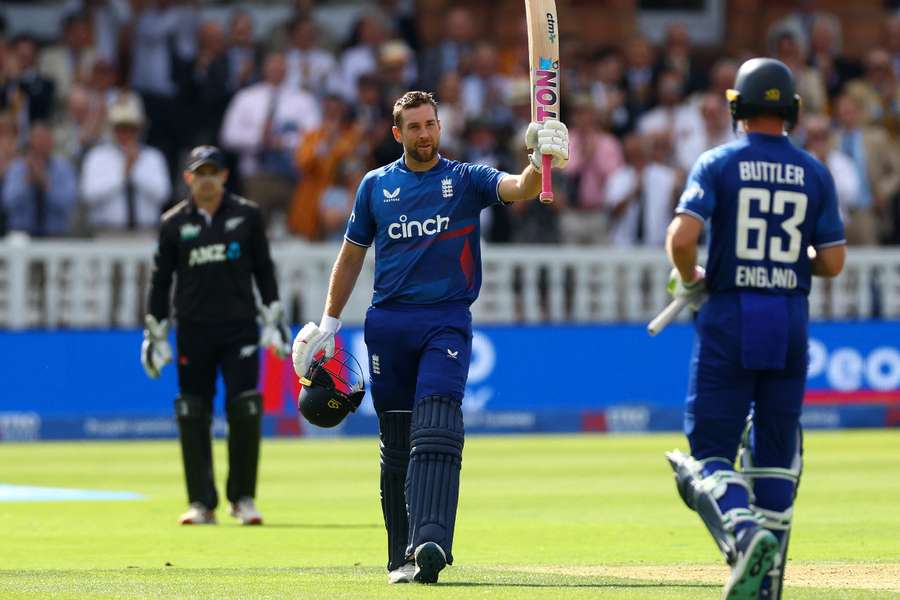 Malan celebrates after reaching his century