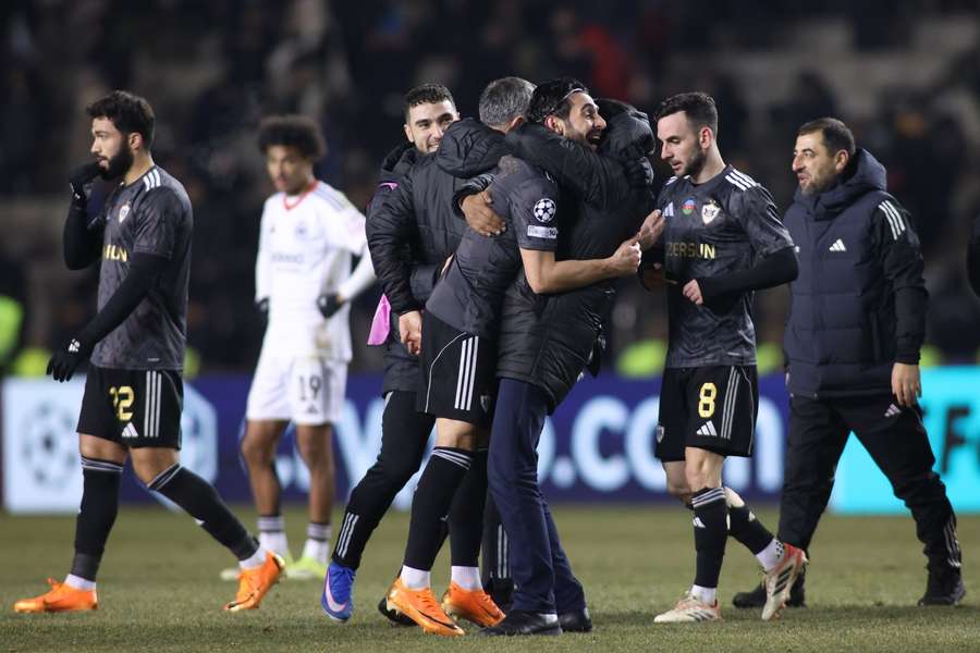 Qarabag's players celebrate after winning