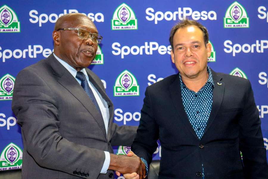 Gor Mahia manager Martins Neiva shakes hands with the chairman