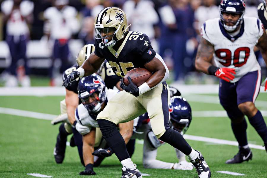 Ellis Merriweather (35) of the Saints runs the ball during the preseason game against the Texans at Caesars Superdome