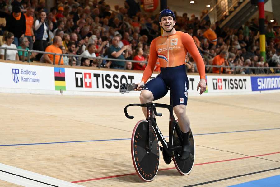 Lavreysen celebrates after winning the men's team sprint final