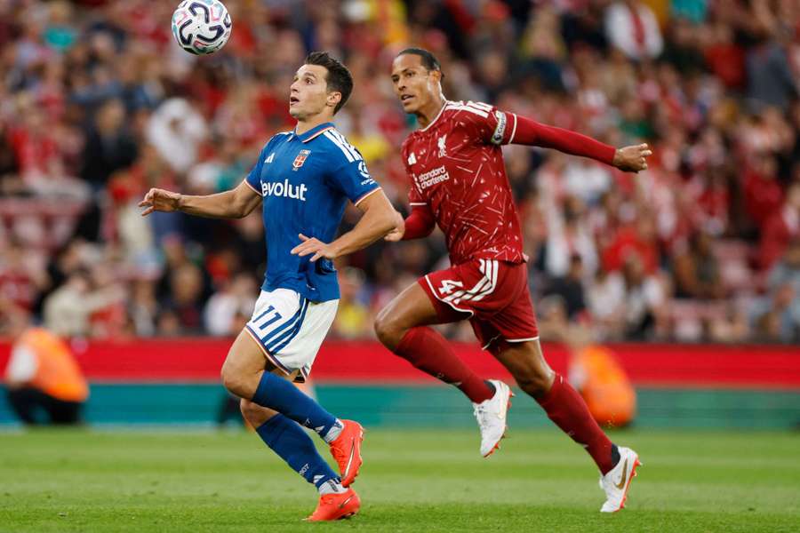 Van Dijk (right) in action during pre-season Van Dijk (right) in action during pre-season