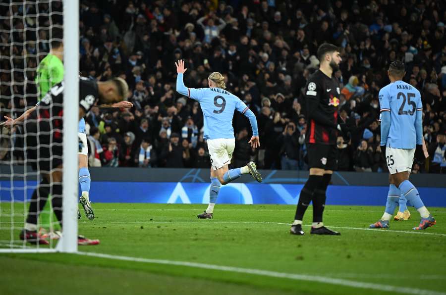 Erling Haaland celebrates scoring Man City's sixth goal - his fifth - of the evening