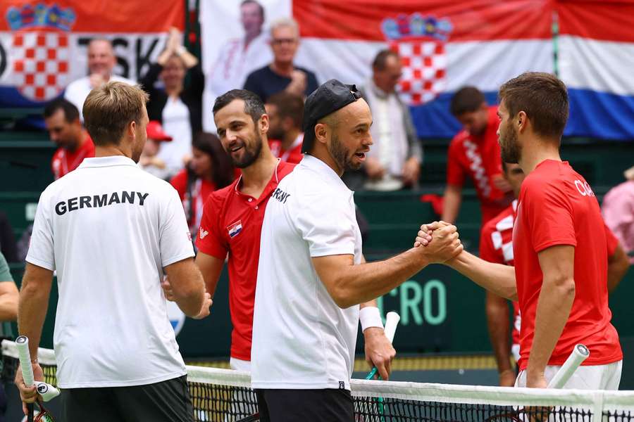 Krawietz (l.) spielt ab nächster Saison mit Weltklasse-Mann Pavic (Zweiter von l.) Krawietz (l.) spielt ab nächster Saison mit Weltklasse-Mann Pavic (Zweiter von l.)