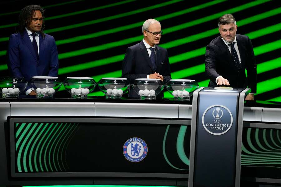 Former French player Christian Karembeu, UEFA's Giorgio Marchetti and former Polish player Michal Zewlakow during the Conference League draw