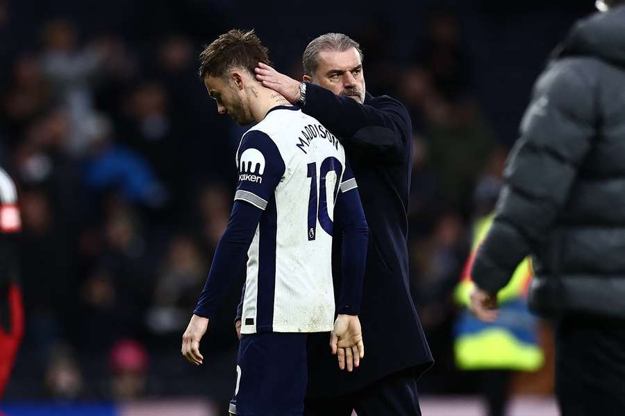 Ange Postecoglou consoles Tottenham midfielder James Maddison