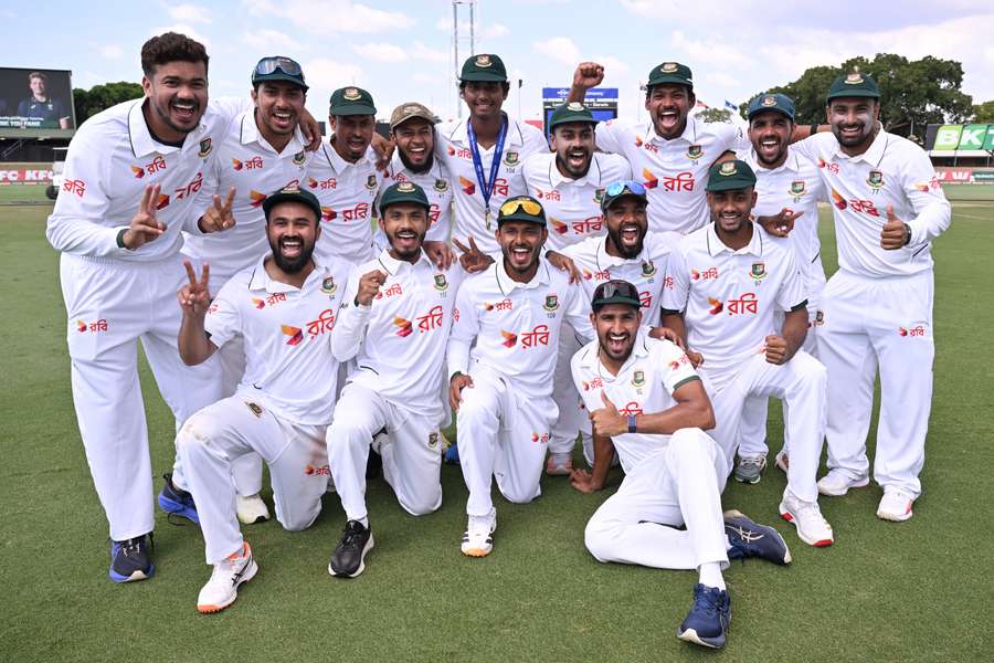 Bangladesh players pose for a photo after their team's victory Bangladesh players pose for a photo after their team's victory