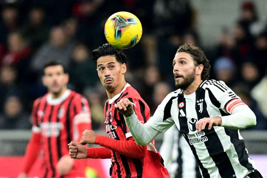 AC Milan's Tijjani Reijnders in action with Juventus' Manuel Locatelli on the weekend