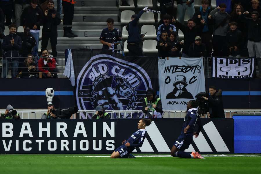 Ilan Kebbal celebrates scoring his team's first goal during the match between Paris FC and Lorient