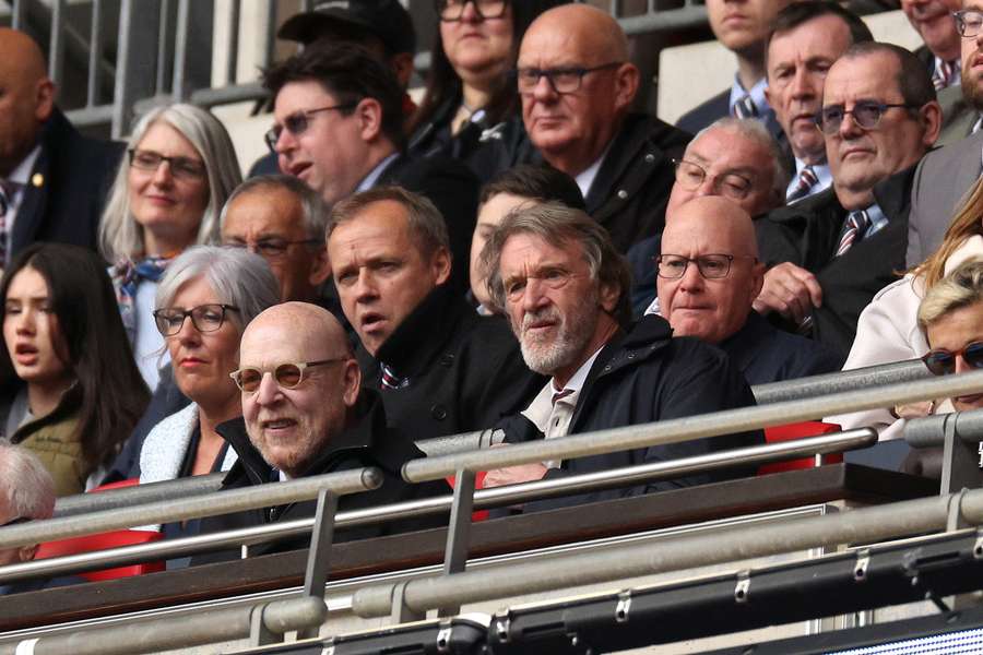 Avram Glazer, and Sir Jim Ratcliffe, Shareholders of Manchester United, look on from the stands