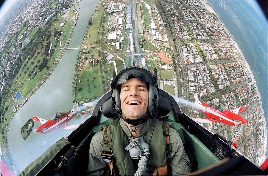 Australian F1 driver Mark Webber flies high above Albert Park Circuit in 2002